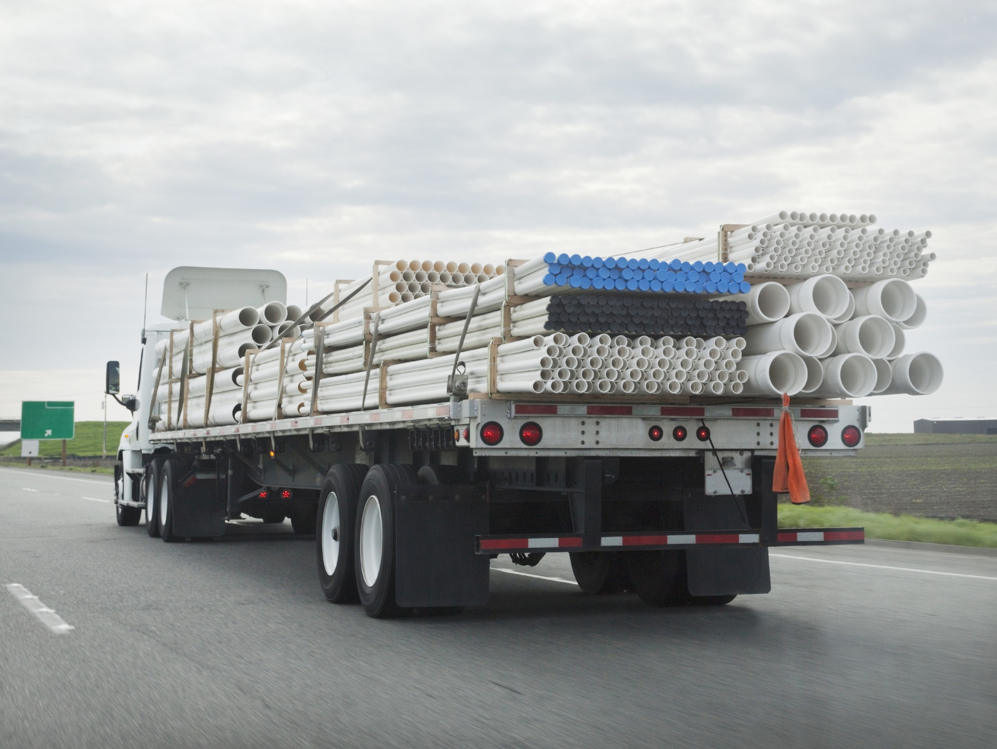 Flat bed trucking hauling cargo